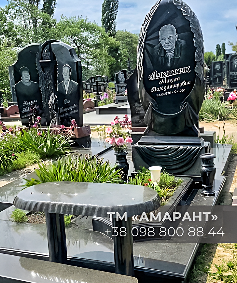 Гранитный памятник овальной формы с барельефом и столиком «АМАРАНТ» №35